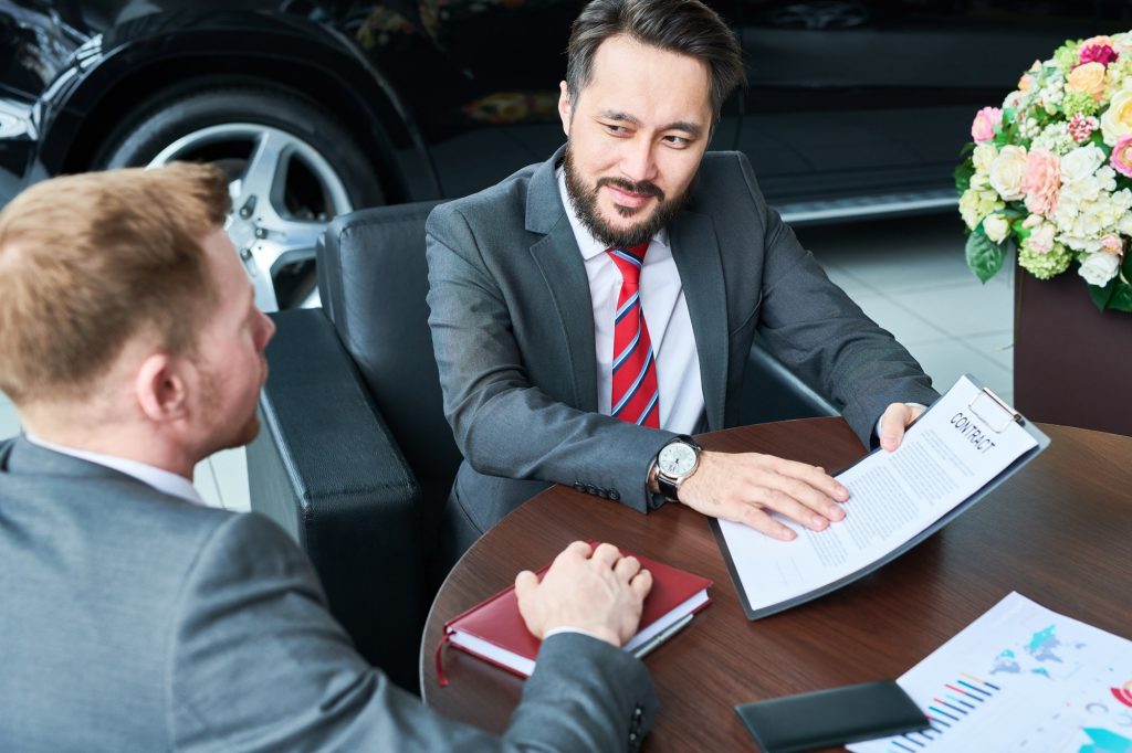 Asian man with business partner