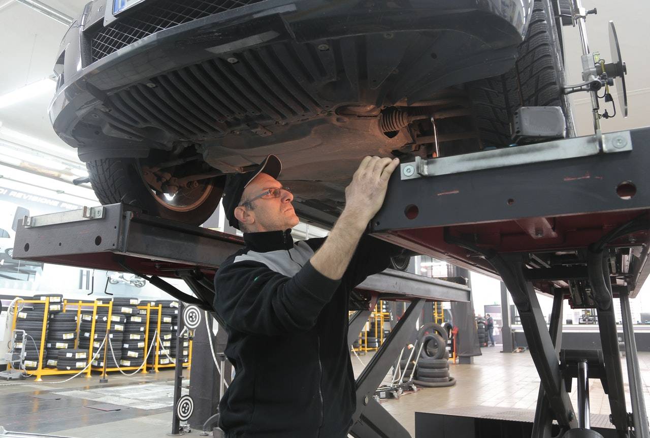 A guy doing vehicle inspection - darren yaw singapore